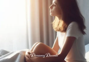 ex boyfriend in dream meaning _ The woman wakes up from her dream, sitting up in her bed with a contemplative expression. The morning sun is shining through the window, indicating a new day and possibly new insights or emotions regarding her past relationship.