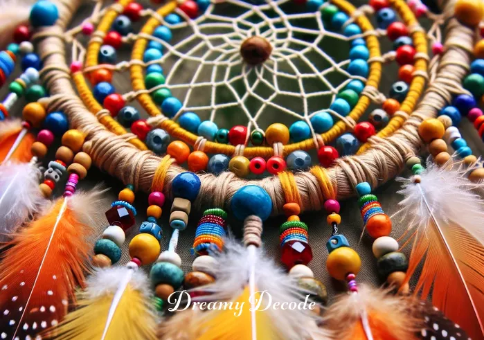 cherokee dream catcher meaning _ A close-up view of a nearly completed Cherokee dream catcher, featuring vibrant beads and feathers attached to the woven web, each element meticulously placed to add color and meaning, representing strength, wisdom, and the journey of dreams.
